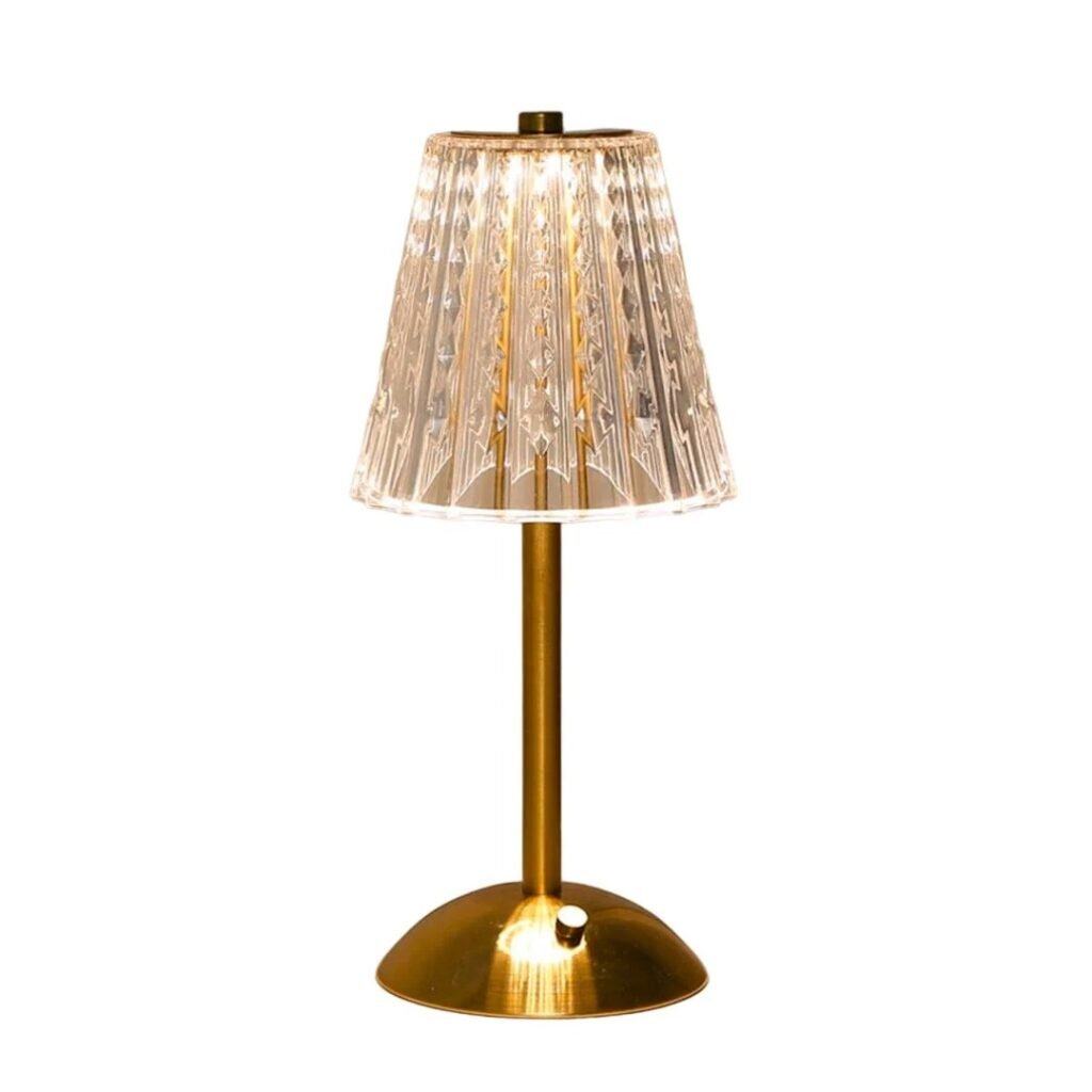 Decorative desk lamp with a crystal-patterned shade and a golden base.