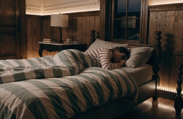 Safe and calm bedroom setup with dim warm white or amber LED strip lights for nighttime use
